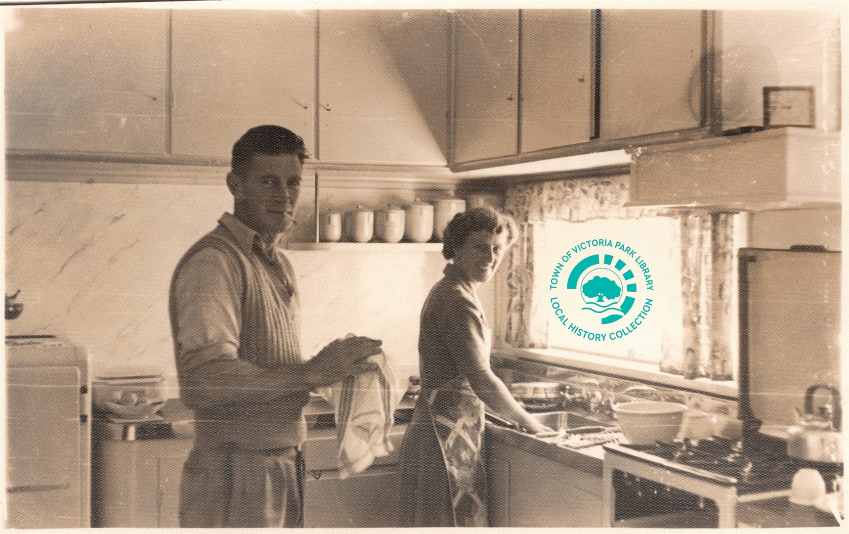 PH00043-11 Ken & Irene Stewart doing dishes 107 Westminster St, May 1953 Image