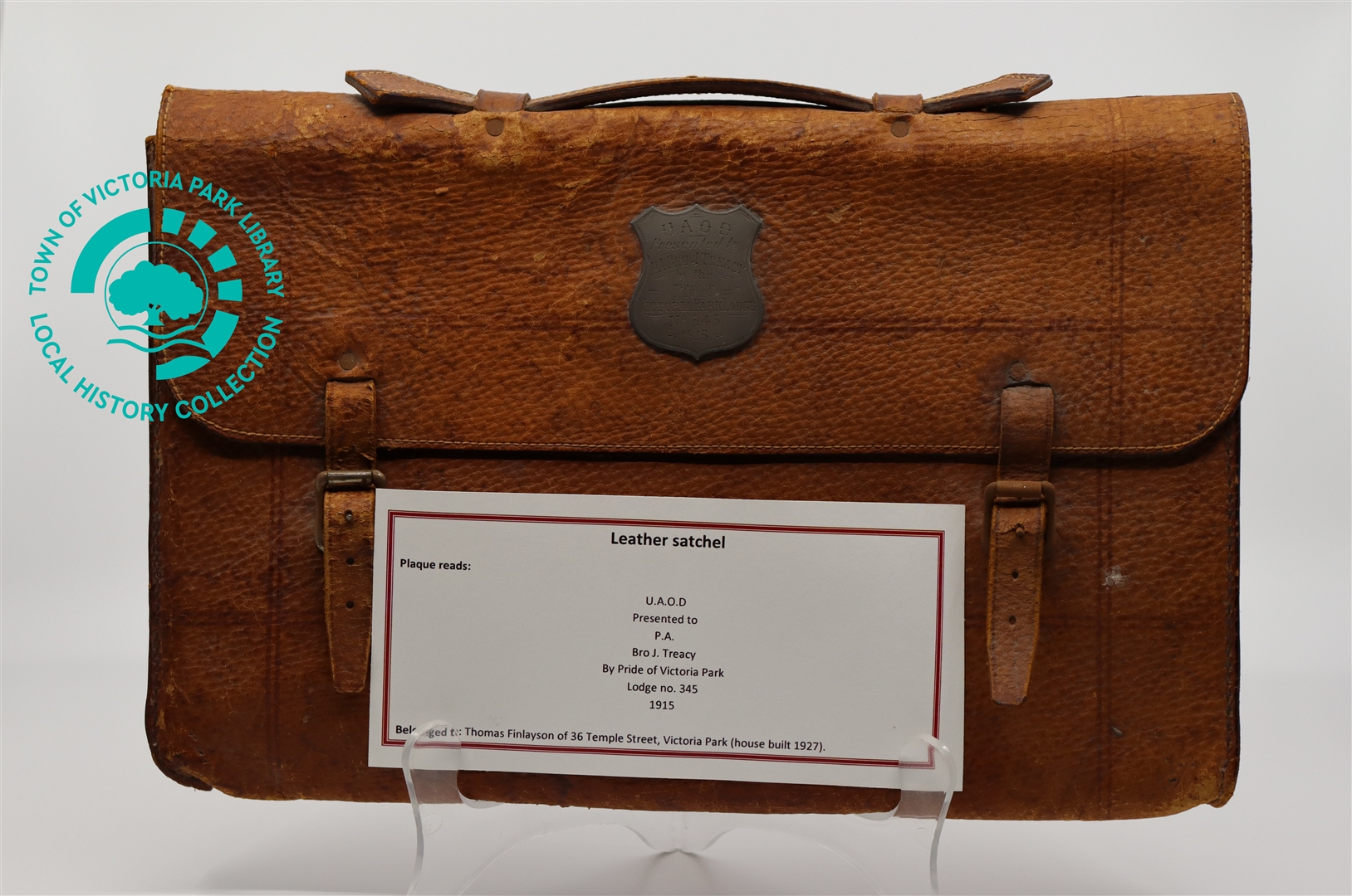 Front view of Mr J. Treacy's leather satchel with display note Image