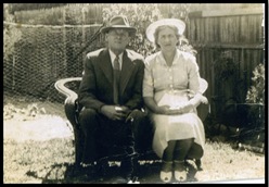 Robert Edward Arthur and Florence Rose Elizabeth BELL, dressed for a family wedding, posed in the backyard of the Bell family residence, 953 Albany Highway, East Victoria Park. 