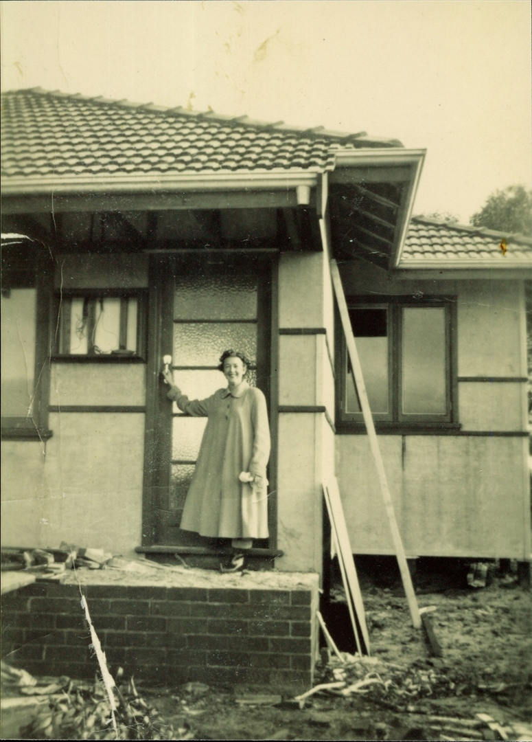 PH00031-04 Greta Flatman at the front door of 3 Harris Street Carlisle during its construction (PH29004) Image