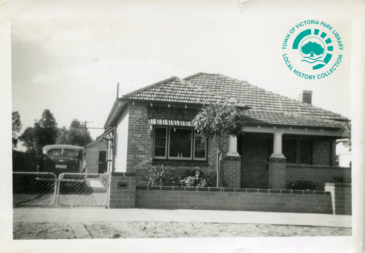 PH00044-11 28 Star Street, Carlisle - with front homemade cement brick fence built, c. 1951 Image