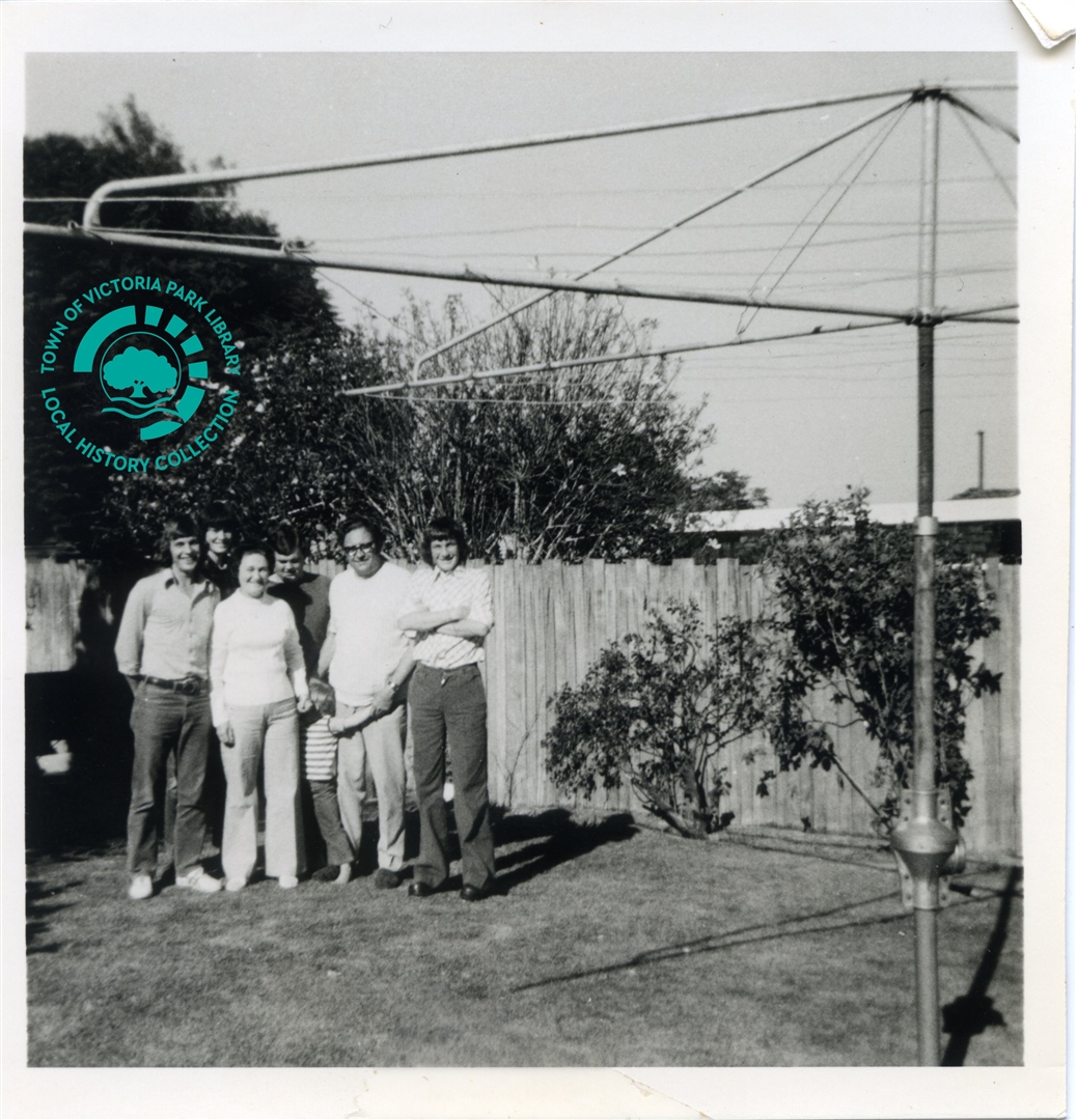 PH00045-01 The Newman Family under their Hills Hoist in the backyard of 16 Whittlesford Street, East Victoria Park, 1977 Image